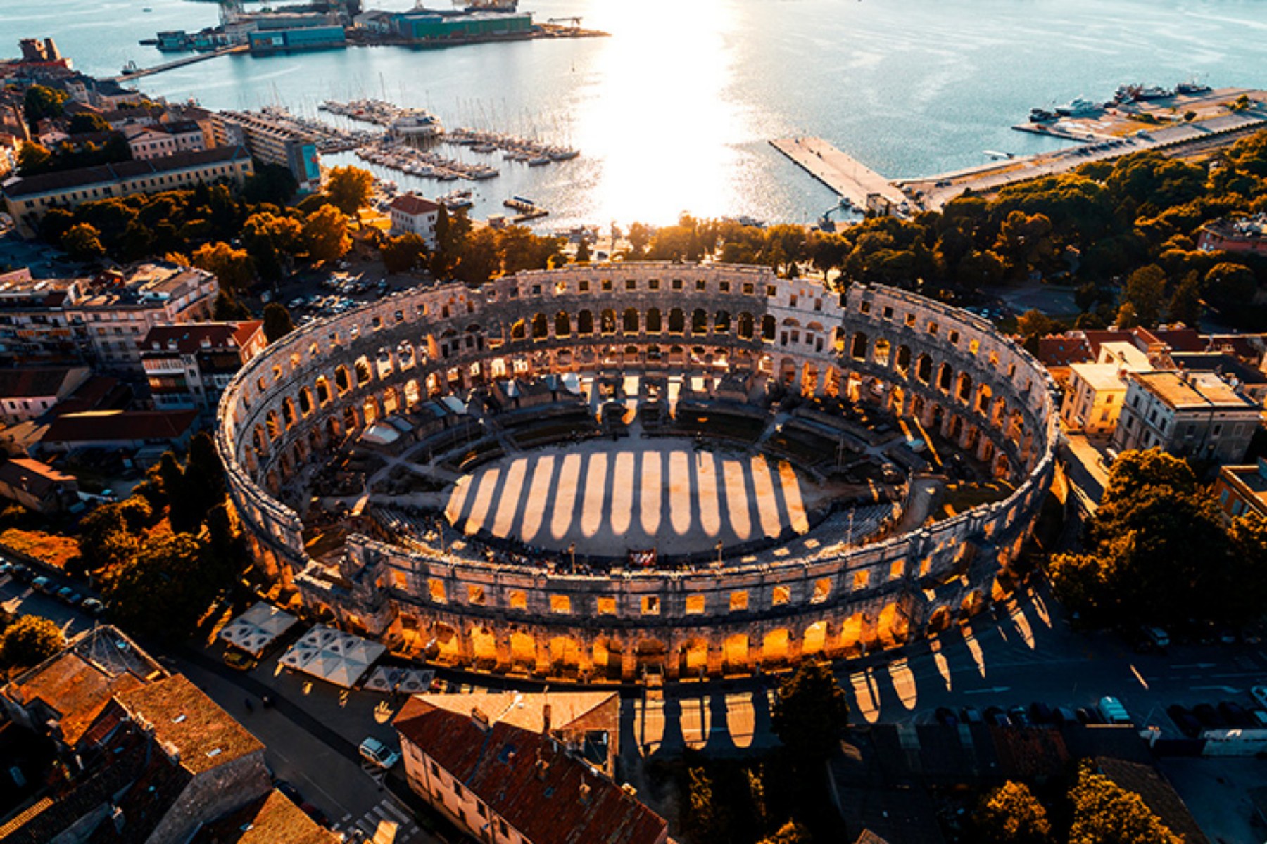 Boat Excursions Pula -Arena is a symbol of Pula, that you can see when you live port and when you get back